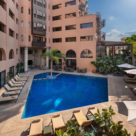 Hivernage Hotel & Spa Marrakesh Bagian luar foto The swimming pool at the hotel