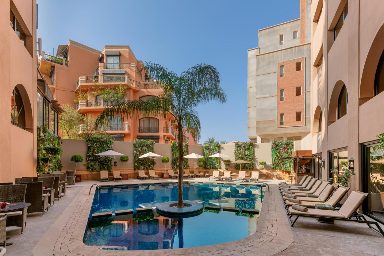 Hivernage Hotel & Spa Marrakesh Bagian luar foto The swimming pool at the hotel