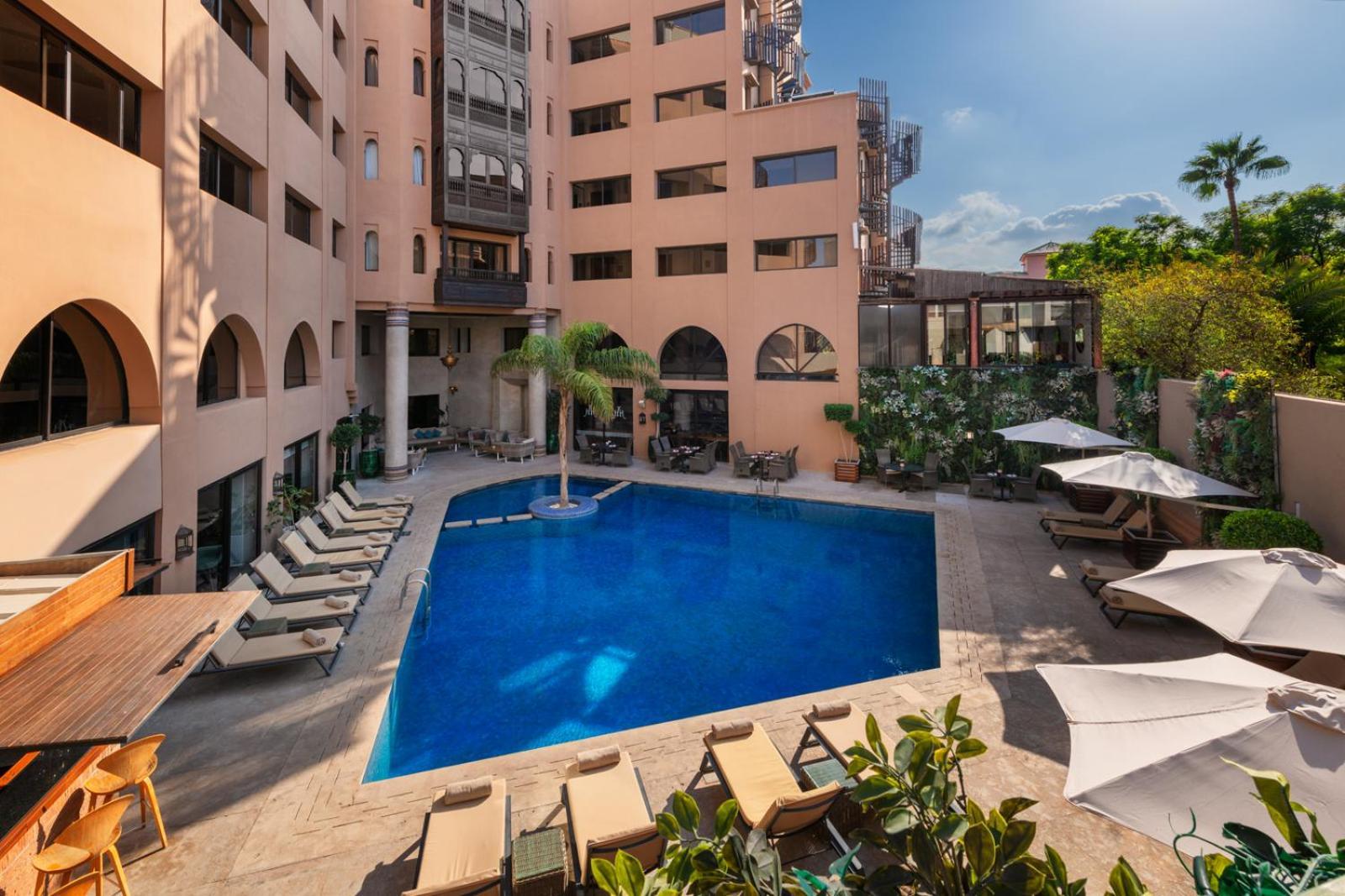 Hivernage Hotel & Spa Marrakesh Bagian luar foto The swimming pool at the hotel